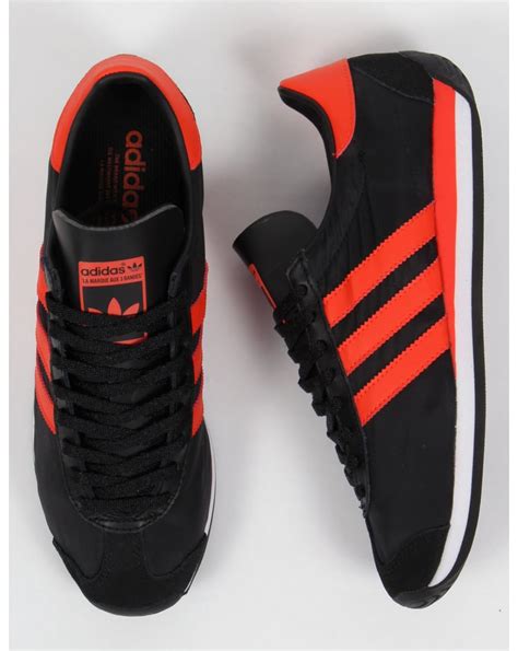 adidas sneaker oranje|Adidas black and orange shoes.